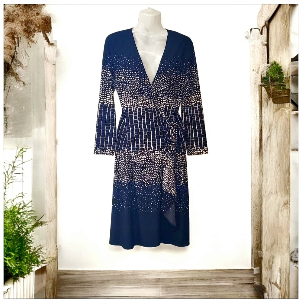 BCBGMaxAzria Black and Cream Long Sleeve Wrap Dress.